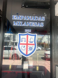 the window of a business with a logo on it