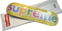 a supreme skateboard with the word supreme on it