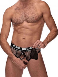 a man is posing for a photo wearing a male power underwear