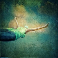 an image of a woman swimming in the water