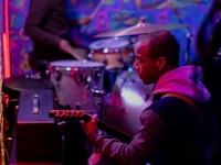 a man playing a guitar