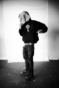 a black and white photo of a man in a hoodie