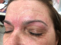 an image of a woman's eyebrows after a treatment