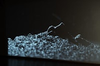 a projection of a mountain in a dark room