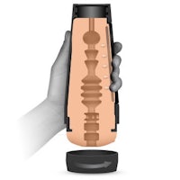 a hand holding a bottle with a skeleton inside