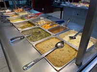 a buffet with a lot of food on it