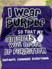 a purple t - shirt that says i wear purple so that my angels will never be forgotten