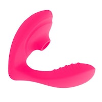 a pink sex toy on a white background