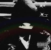 an image of a man in a hoodie with a rainbow behind him