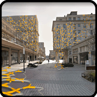a city street with buildings and trees