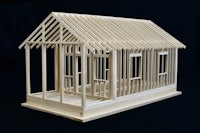 a model of a house made of wood