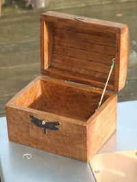 a small wooden box sitting on a table