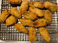 fried chicken nuggets on a cooling rack