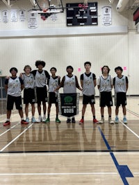 GP Gilas Boys after their basketball game, posed all together in red jerseys