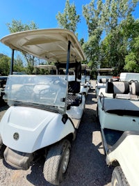 yamaha golf carts parked in a lot