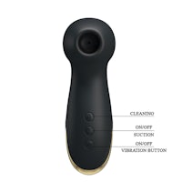 an image of a black vibrator with a label on it