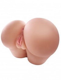 an image of a doll with a large nude butt
