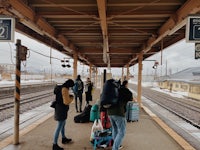 a group of people at a train station