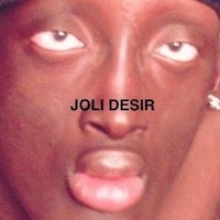 a black man wearing a hat with the words joli desir on it