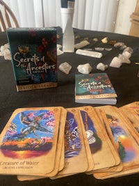 a table full of books and cards on a table