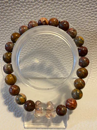 a bracelet with tiger's eye beads on it