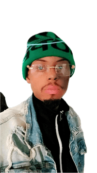 a man wearing glasses and a green beanie