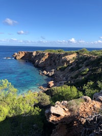 a rocky cliff overlooking the ocean