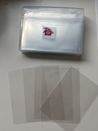 a clear plastic container with a sticker on it