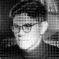 a black and white photo of a man with glasses