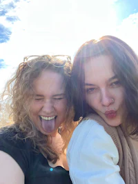 two women posing for a selfie