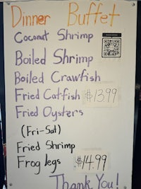 a sign that says dinner buffet