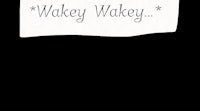 a sign that says wakey wakey