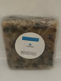 a bag of soap with a blue label on it