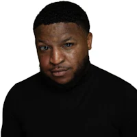 a black man wearing a turtle neck shirt