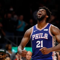the philadelphia 76ers player is celebrating during a game