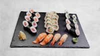 japanese sushi on a slate board
