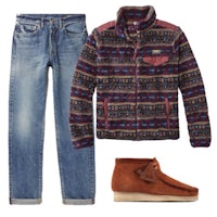 a pair of jeans, a sweater, and a pair of boots