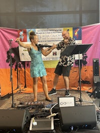 a man and a woman on stage