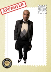 a man in a suit and tie standing in front of a postage stamp
