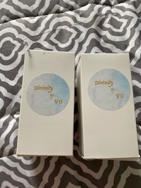 two boxes with the word divinity on them