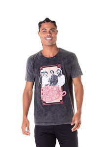 a man wearing a t - shirt with a picture of a man and a woman