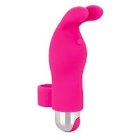 a pink bunny shaped sex toy on a white background