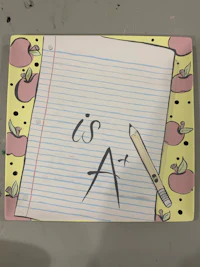 a notepad with a pen and pencil on it