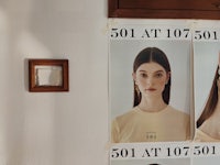 a group of posters on the wall of a room