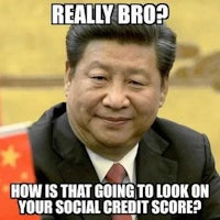 a man with a chinese flag and a man in a suit