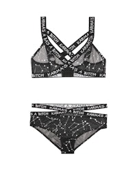 a black and white bikini set with stars on it