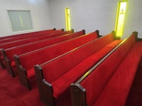 red pews in a church
