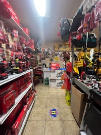 a store with a lot of tools on the shelves