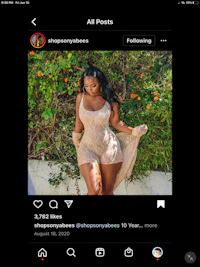 a woman is posing on an instagram screen