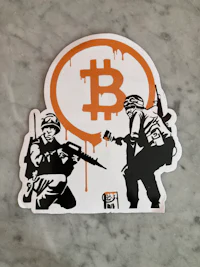 a sticker with a bitcoin logo on it